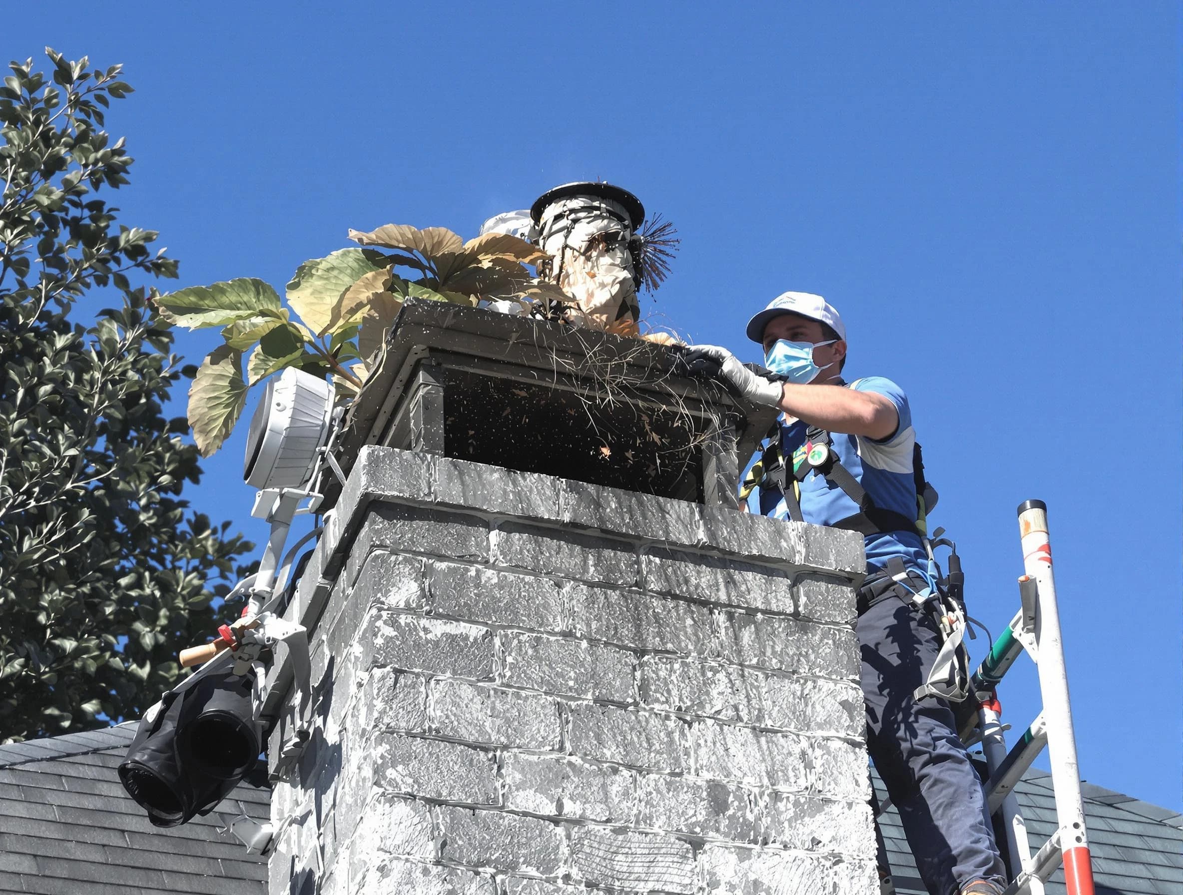 Carefree Chimney Sweep specialist performing chimney cleaning in Carefree, AZ
