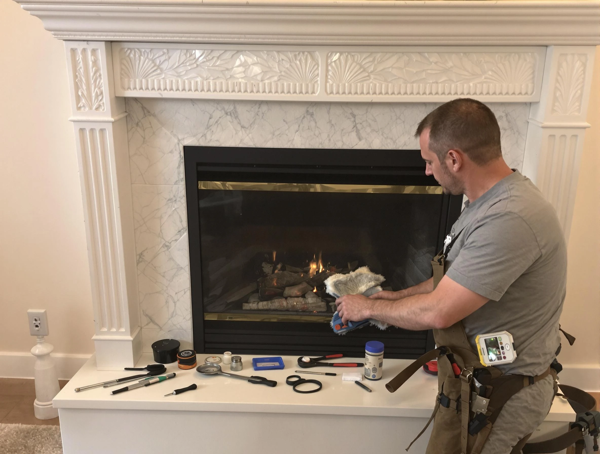 Carefree Chimney Sweep performing fireplace maintenance in Carefree, AZ